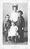 Ed and Elva Dooley's children. Helen Teressa, age 8 yrs; Bernard Francis, age 6 yrs; Clark James, age 4 yrs; Genevieve May, age 2 yrs. Circa 1916.